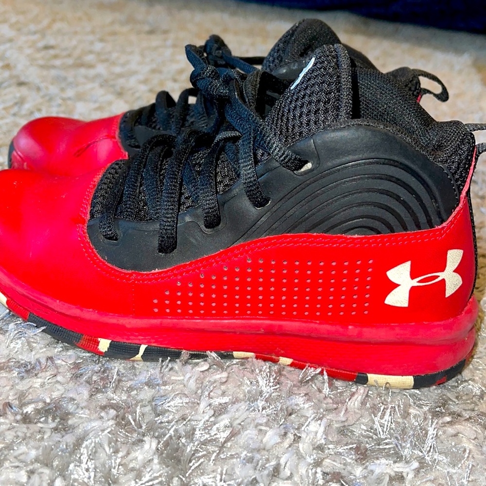Red and black under armor shoes